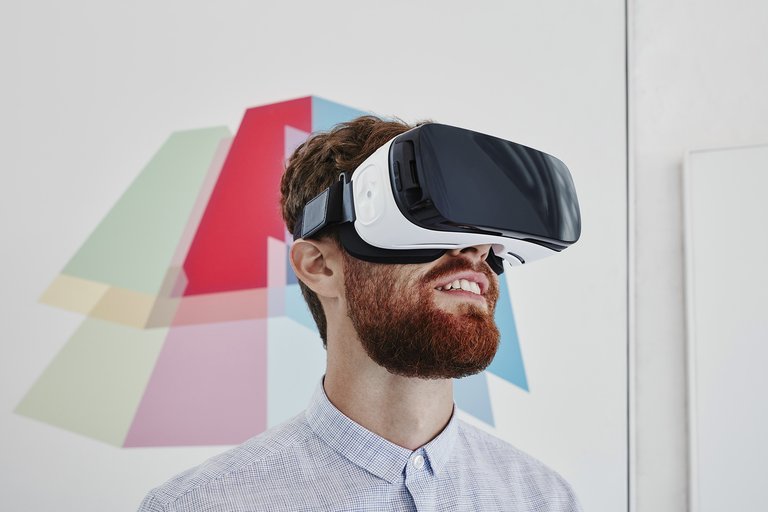 Man using virtual reality headset.jpg