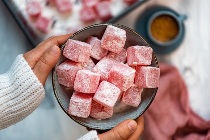 Woman-holding-pink-Turkish-Delight-Lokum-in-a-bowl.jpg